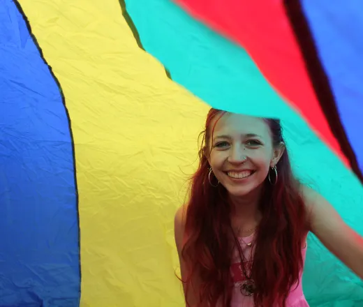 camper under parachute